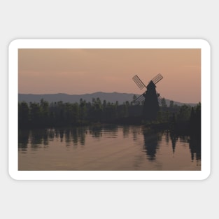 A mill at sunset Sticker